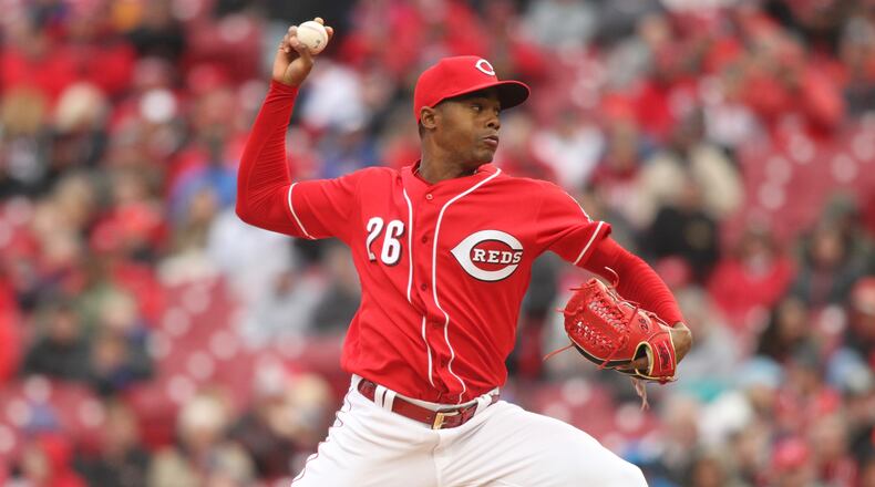 Reds closer Raisel Iglesias pitches against the Cubs on Monday, April 2, 2018, at Great American Ball Park in Cincinnati.