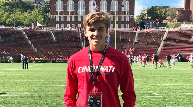 Greenon kicker Nathan Hawks poses for a photo at a Cincinnati Bearcats game at Nippert Stadium.