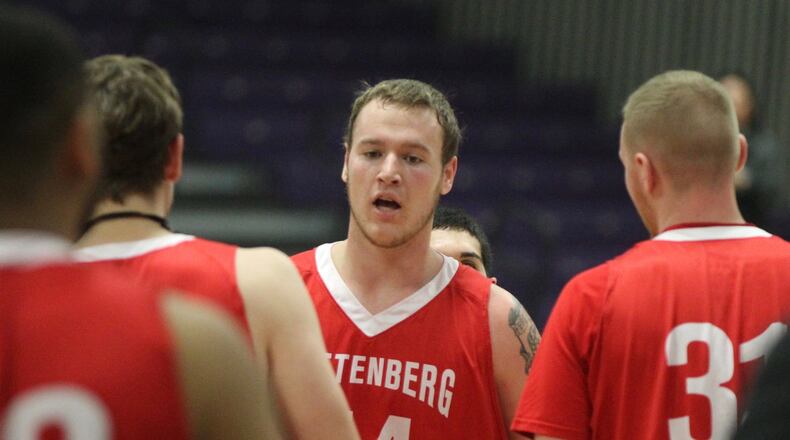 Wittenberg’s Connor Seipel returns to the bench after a game against Otterbein on Nov. 25 at Capital University in Bexley. David Jablonski/Staff