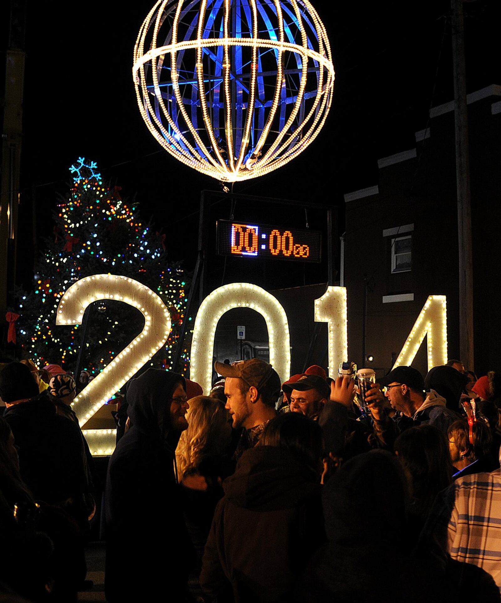 Scenes from past New Carlisle New Year’s Eve Ball Drop events. MARSHALL GORBY / STAFF FILE PHOTO