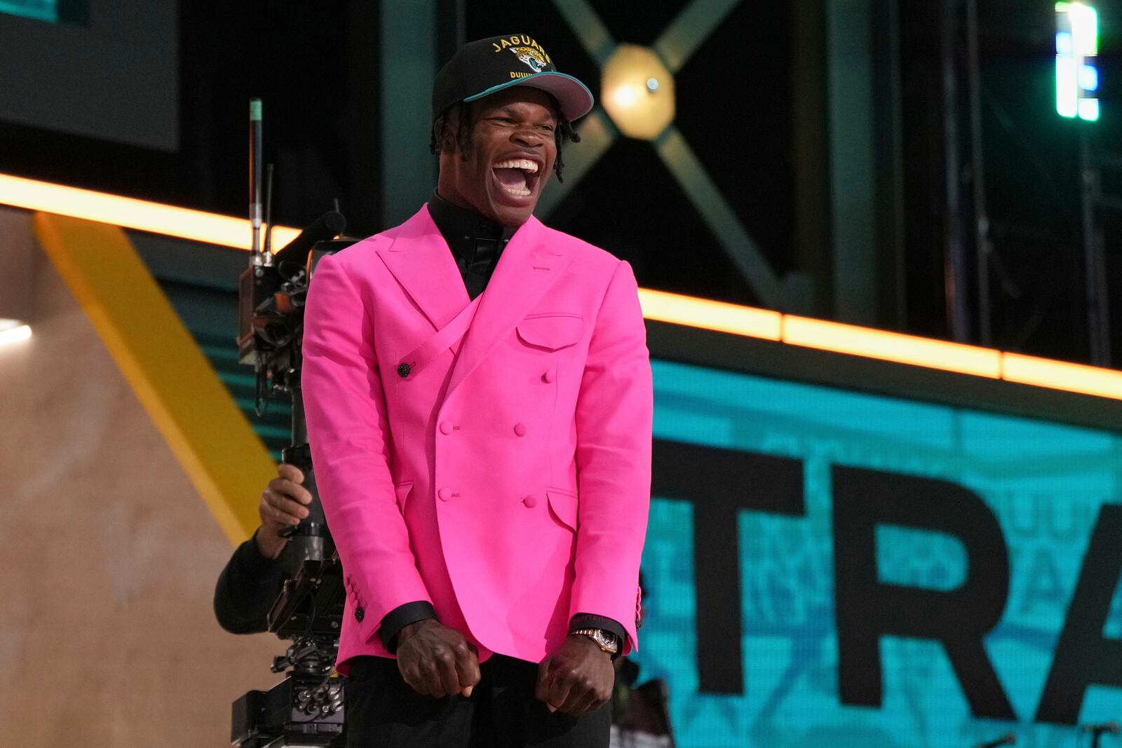 Colorado wide receiver Travis Hunter celebrates after being chosen by the Jacksonville Jaguars with the second overall pick during the first round of the NFL football draft, Thursday, April 24, 2025, in Green Bay, Wis. (AP Photo/Jeff Roberson)