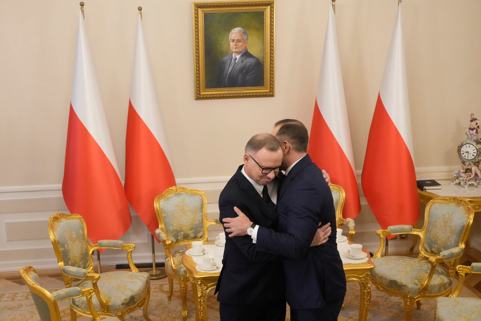Poland's outgoing President Andrzej Duda, left, welcomes the President Elect Karol Nawrocki at the Presidential Palace in Warsaw, Poland, Tuesday, June 3, 2025. (AP Photo/Czarek Sokolowski)