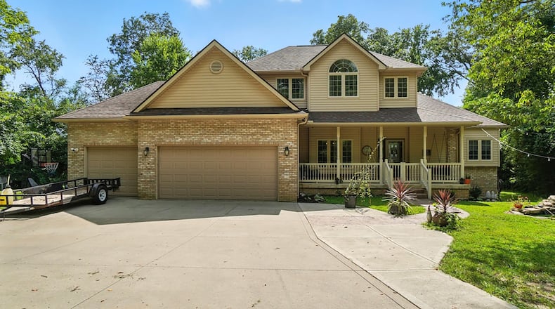 This two story home sits on 2.46 mostly wooded acres in Springfield. It has a covered front porch and a first floor primary suite. CONTRIBUTED