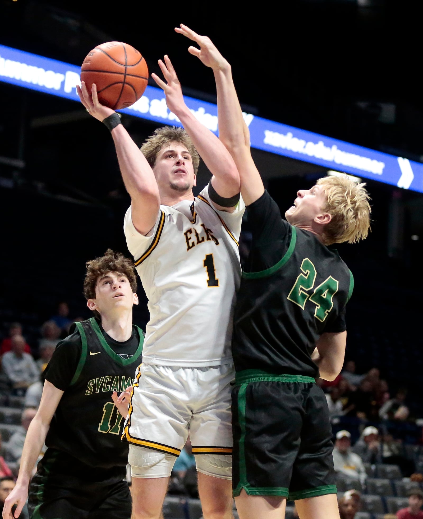 Centerville junior Sam Keely goes up for a shot during a Division I district title game on Sunday, March 8, 2026, at the Cintas Center in Cincinnati. STEVEN WRIGHT / STAFF