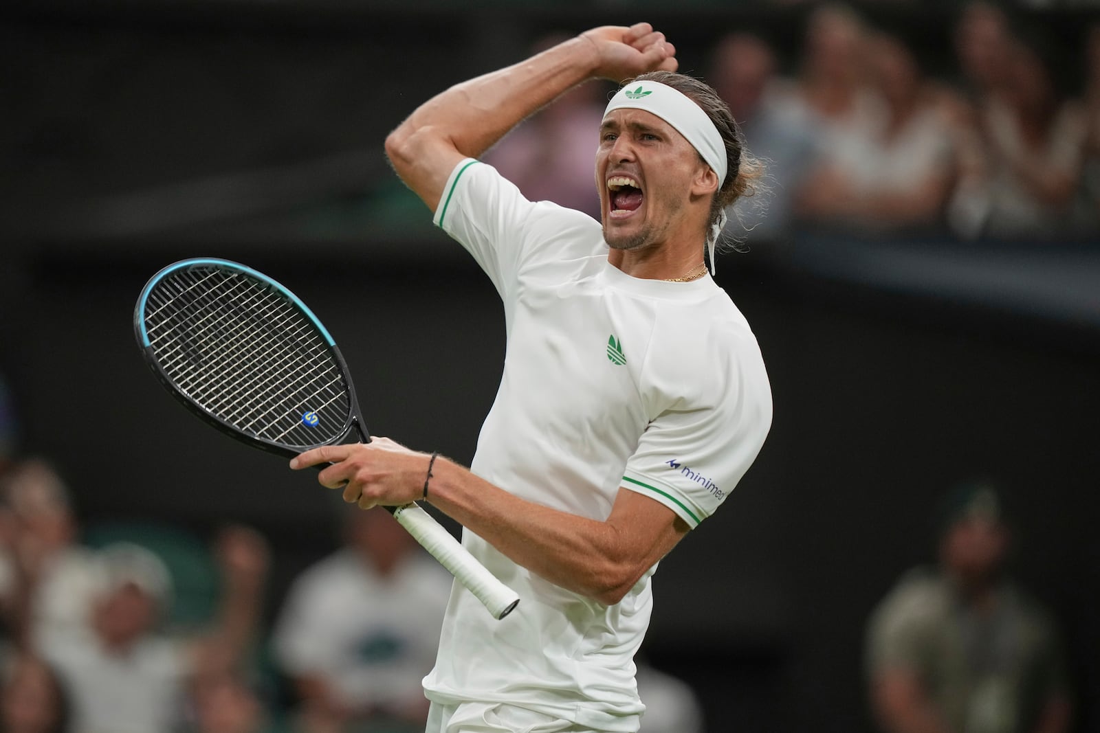 Alexander Zverev of Germany reacts after the second set against Arthur Rinderknech of France in their first round men's singles match at the Wimbledon Tennis Championships in London, Monday, June 30, 2025. (AP Photo/Alastair Grant)