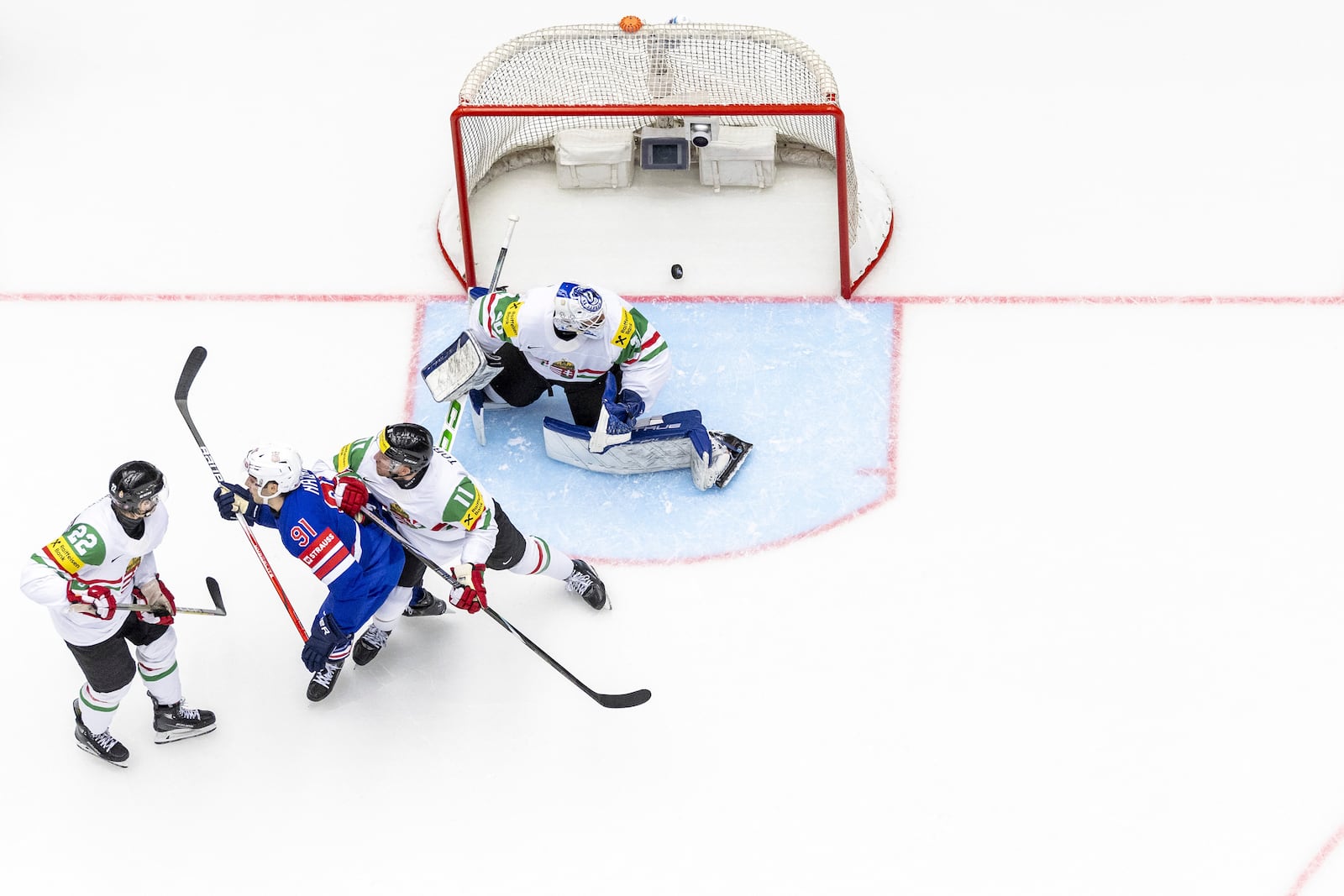 USA's forward Frank Nazar, second left, scores his side's fourth goal during the IIHF Ice Hockey World Championship group B match between USA and Hungary in Herning, Denmark, Sunday, May 11, 2025. (Salvatore Di Nolfi/Keystone via AP)