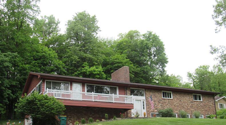 The 4-bedroom bi-level home sits on a 1.12-acre lot and offers about 3,250 sq. ft. of living space. The finished lower level includes a bedroom and one of the 3 full baths. CONTRIBUTED PHOTO