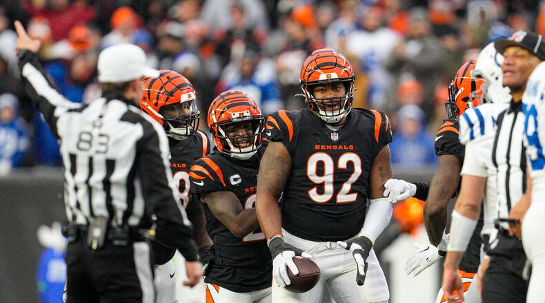 Cincinnati Bengals defensive tackle B.J. Hill (92) after an interception against the Indianapolis Colts in the second half of an NFL football game in Cincinnati, Sunday, Dec. 10, 2023. (AP Photo/Jeff Dean)