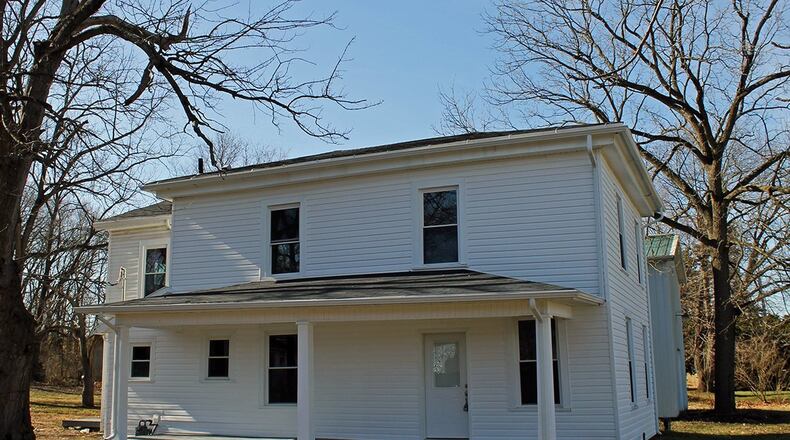 This updated home offers a 24-by-48-foot pole barn/garage. The 4-bedroom home includes about 2,330 sq. ft. of living space and formal living and dining rooms. CONTRIBUTED PHOTO BY VICKIE KAPNAS