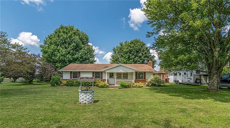 The ranch home with 3 bedrooms and about 1,420 sq. ft. of living space, is set of 5 acres and includes a detached, 2-car garage and 4-stall horse barn. CONTRIBUTED PHOTO