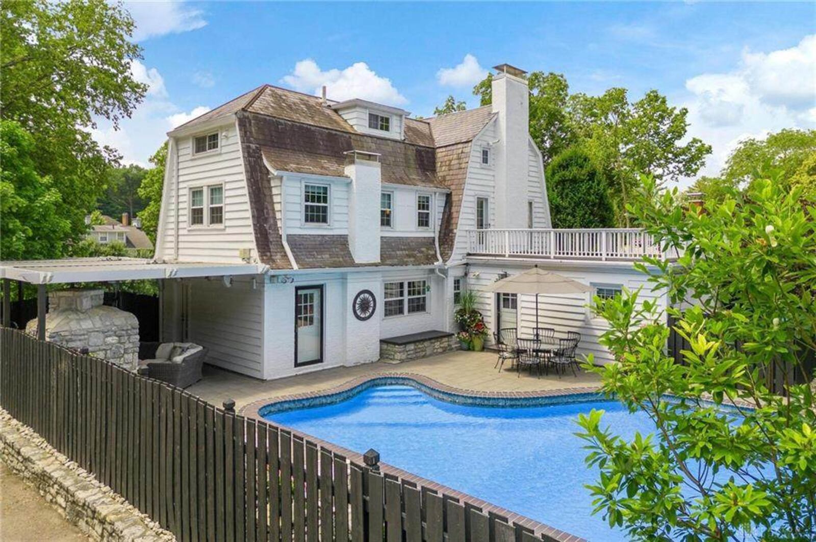 The swimming pool is surrounded by a concrete sun deck and was updated to a saltwater system with new equipment. Contributed