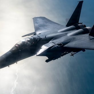 An F-15E Strike Eagle with the 4th Fighter Wing approaches a KC-135 Stratotanker from the 121st Air Refueling Wing to be refueled over the skies of North Carolina, Jan. 21, 2026. Air National Guard photo by Airman Samir Harris