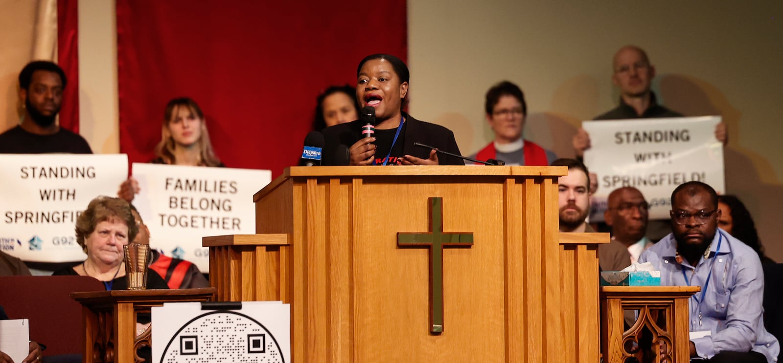 Geurline Jozef, founder of the Haitian Bridge Alliance, speaks during Here We Stand: Faith Leaders for Immigration Justice & Family Unity at St. John Missionary Baptist Church on Monday, Feb. 2, 2026, in Springfield. Pastors and community members gathered to pray and call for the extension of Temporary Protected Status which is scheduled to expire on Tuesday, Feb. 3, 2026. JOSEPH COOKE/STAFF