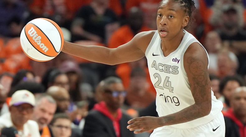 FILE - Las Vegas Aces guard Jewell Loyd (24) drives against the Phoenix Mercury during the first half of Game 3 of the WNBA basketball finals, Wednesday, Oct. 8, 2025, in Phoenix. (AP Photo/Rick Scuteri, File)
