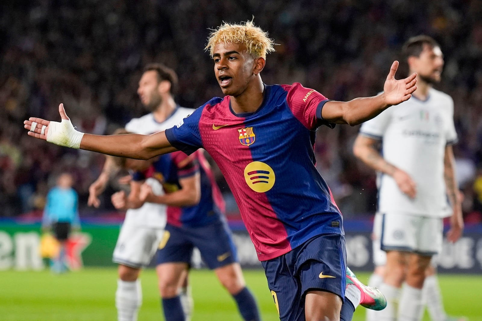Barcelona's Lamine Yamal celebrates after scoring during the Champions League semifinal first leg soccer match between Barcelona and Inter Milan in Barcelona, Spain, Wednesday, April 30, 2025. AP Photo/Emilio Morenatti)