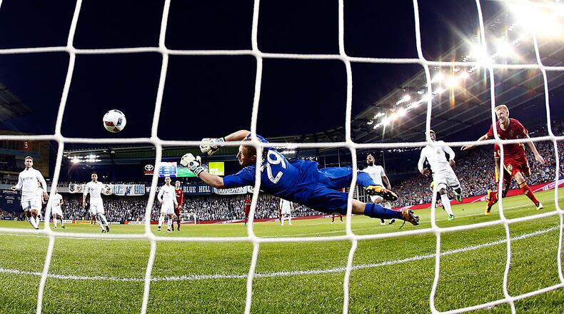 KANSAS CITY, KS - APRIL 02: Justen Glad #15 of Real Salt Lake celebrates shoots past a diving Tim Melia #29 of Sporting Kansas City for a goal during the 1st half of the Major League Soccer match at Children's Mercy Park on April 2, 2016 in Kansas City, Kansas. (Photo by Jamie Squire/Getty Images)