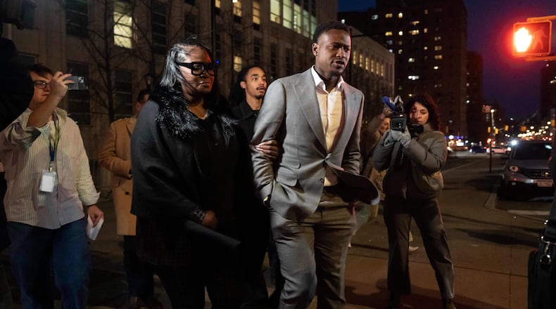 Miami Heat's Terry Rozier, right, leaves Brooklyn federal court, Monday, Dec. 8, 2025, in New York. (AP Photo/Yuki Iwamura)