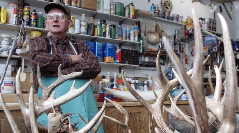 Bob Anderson in the back part of his shop off on Collier Road. Anderson started doing taxidermy in the late 1940s. Staff photo