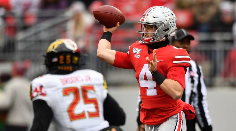 COLUMBUS, OH - NOVEMBER 9: Quarterback Chris Chuguvov #4 of the Ohio State Buckeyes passes in the third quarter against the Maryland Terrapins at Ohio Stadium on November 9, 2019 in Columbus, Ohio. Ohio State defeated Maryland 73-14. (Photo by Jamie Sabau/Getty Images)