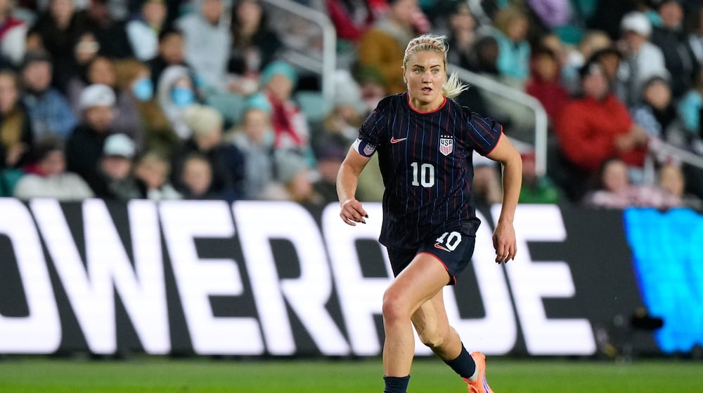 FILE - United States midfielder Lindsey Heaps kicks the ball during the second half of a women's international friendly soccer match against New Zealand, Wednesday, Oct. 29, 2025, in Kansas City, Mo. (AP Photo/Charlie Riedel, file)