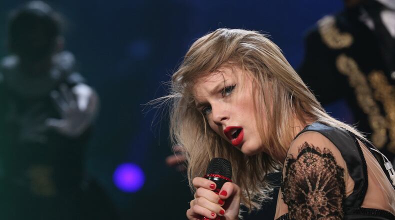 SAITAMA, JAPAN - JUNE 01: Taylor Swift performs at Saitama Super Arena on June 1, 2014 in Saitama, Japan. (Photo by Chris McGrath/Getty Images for TAS)