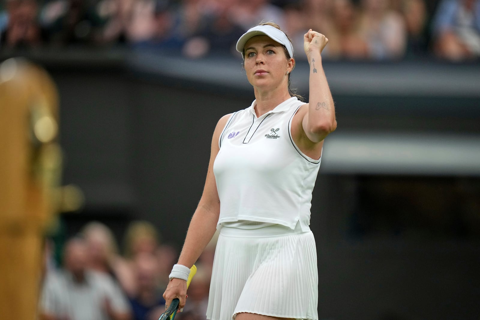 Russia's Anastasia Pavlyuchenkova reacts after beating Sonay Kartal of Britain in a fourth round women's singles match at the Wimbledon Tennis Championships in London, Sunday, July 6, 2025. (AP Photo/Alastair Grant)