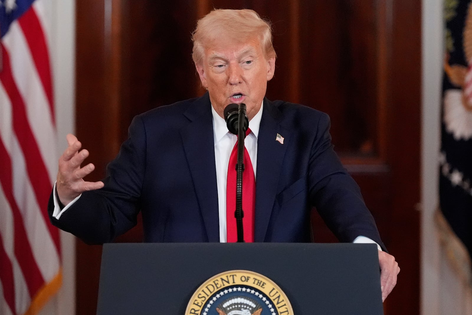 President Donald Trump speaks about investing in America in the Cross Hall of the White House, Wednesday, April 30, 2025, in Washington. (AP Photo/Alex Brandon)