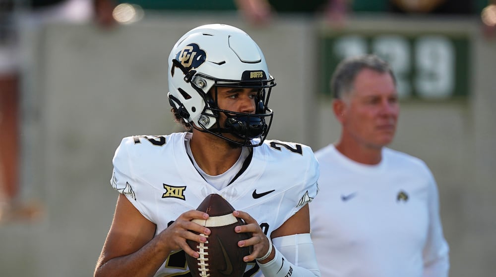 FILE - Colorado quarterback Dominiq Ponder (22) warms up before an NCAA college football game Sept. 14, 2024, in Fort Collins, Colo. (AP Photo/David Zalubowski, File)