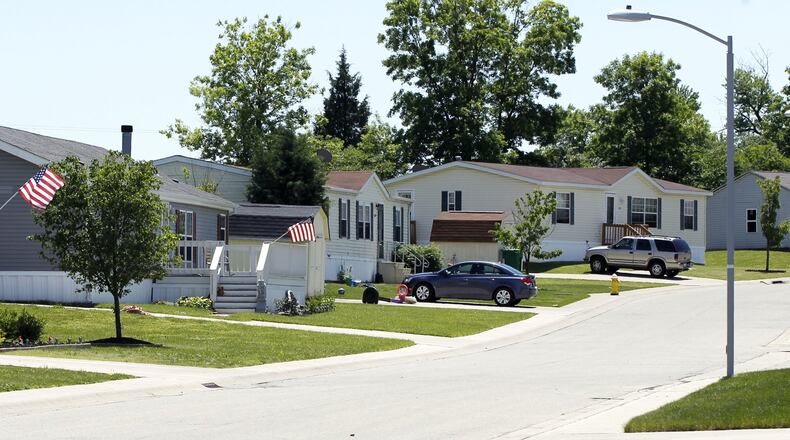 The sales of modular homes, like these in Oakwood Village in Miamisburg, are on the rise in Ohio after a slump over the past several years. TY GREENLEES / STAFF