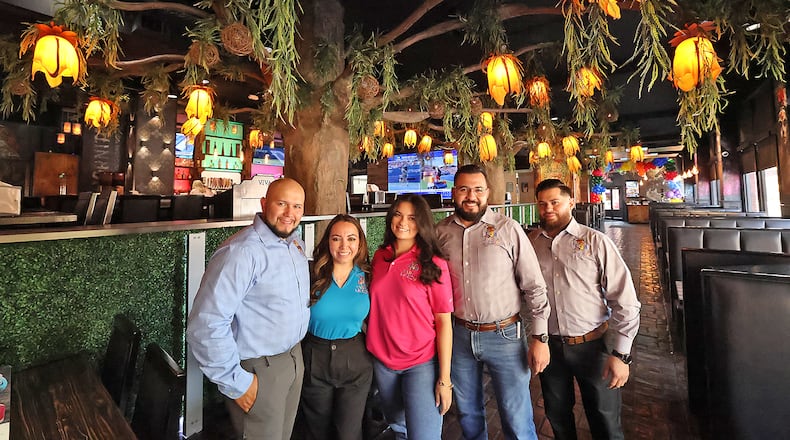 Owners and partners of Viva La Fiesta, from left, Jonny Fuentes, Marta Fuentes, Liliana Villanueva, Gerardo Villanueva and Luis Miranda Tuesday, August 27, 2024. The new Mexican restaurant is scheduled to have its grand opening on Sept. 4. BILL LACKEY/STAFF
