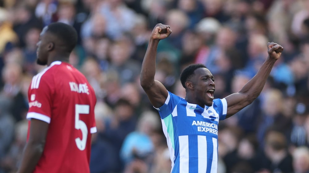 Brighton's Danny Welbeck celebrates after scoring during the English Premier League soccer match between Brighton and Liverpool in Brighton, Saturday, March 21, 2026. (AP Photo/Ian Walton)