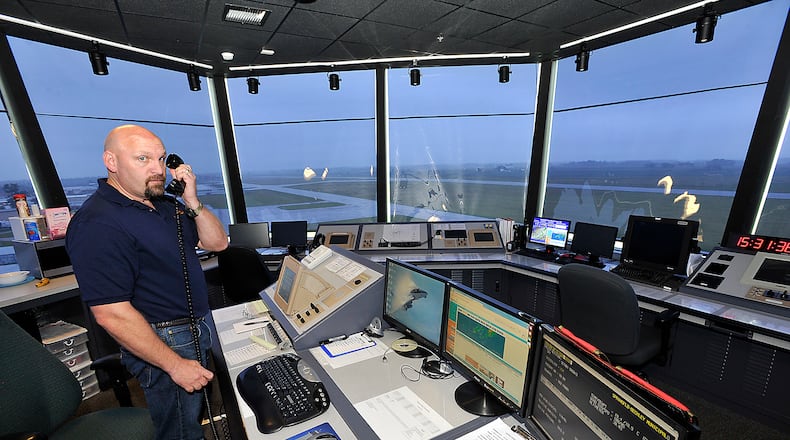 Bill Masseth, an air traffic controller at Springfield Beckley Municipal Airport, at work in the airport’s traffic control tower in 2013. FILE