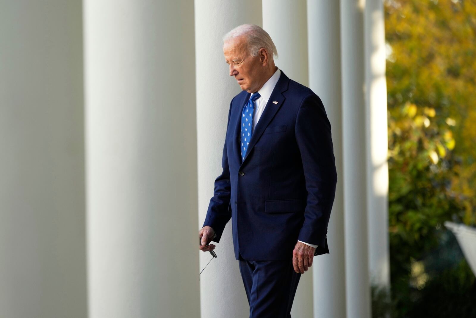 FILE - President Joe Biden walks out to speak in the Rose Garden of the White House in Washington, Nov. 26, 2024. (AP Photo/Ben Curtis, File)