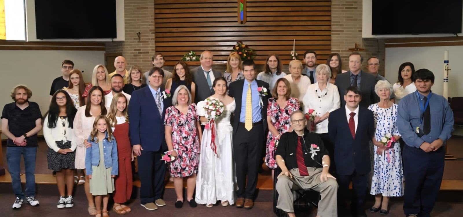 Bryan Szekacs (bottom right, sitting) passed away Sept. 21. He and his wife, Beth's, son, Austin, got married Sept. 13. The couple moved their wedding to this year instead of next so his dad could be a part of it. Bryan, who was in the hospital but determined to go to the wedding, was discharged to attend the “beautiful day.” Contributed