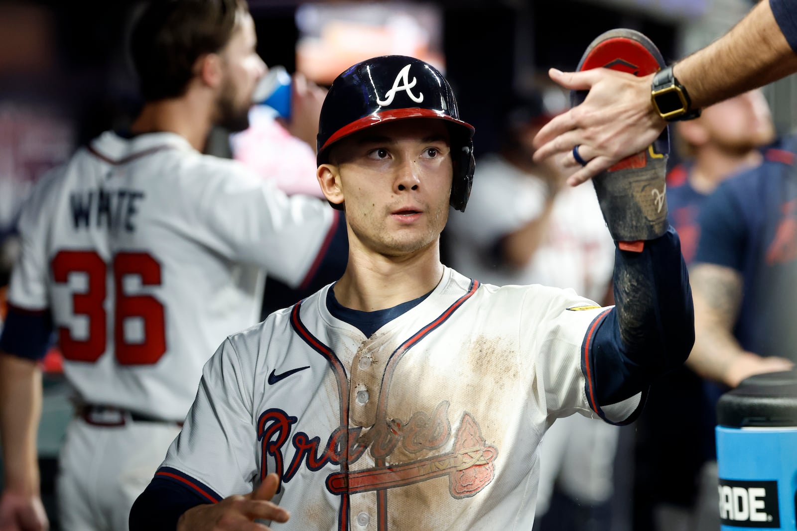 Atlanta Braves' Stuart Fairchild celebrates with teammates after scoring during the ninth inning of a baseball game against the Cincinnati Reds, Tuesday, May 6, 2025, in Atlanta. (AP Photo/Butch Dill)