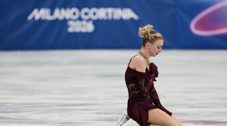Amber Glenn of the United States competes during the women's short program figure skating at the 2026 Winter Olympics, in Milan, Italy, Tuesday, Feb. 17, 2026. (AP Photo/Francisco Seco)