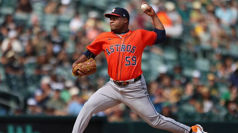 FILE - Houston Astros pitcher Framber Valdez throws to an Athletics batter during the third inning of a baseball game Sept. 25, 2025, in West Sacramento, Calif. (AP Photo/Scott Marshall, File)