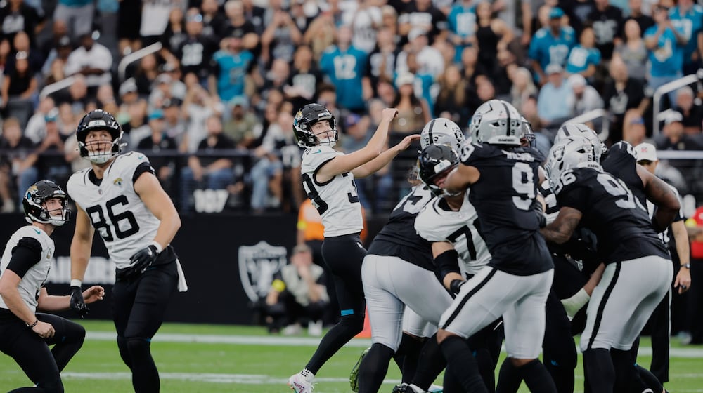 Jacksonville Jaguars place kicker Cam Little (39) watches his 68-yard field goal during the first half of an NFL football game against the Las Vegas Raiders, Sunday, Nov. 2, 2025, in Las Vegas. (AP Photo/Steve Marcus)