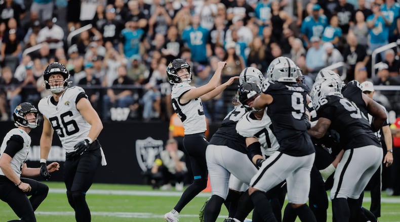 Jacksonville Jaguars place kicker Cam Little (39) watches his 68-yard field goal during the first half of an NFL football game against the Las Vegas Raiders, Sunday, Nov. 2, 2025, in Las Vegas. (AP Photo/Steve Marcus)