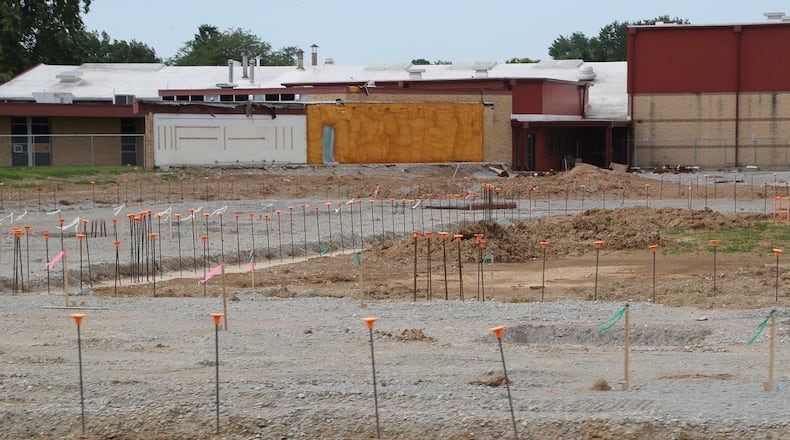 Construction continues on the new Greenon School located behind Indian Valley Middle School Friday. BILL LACKEY/STAFF