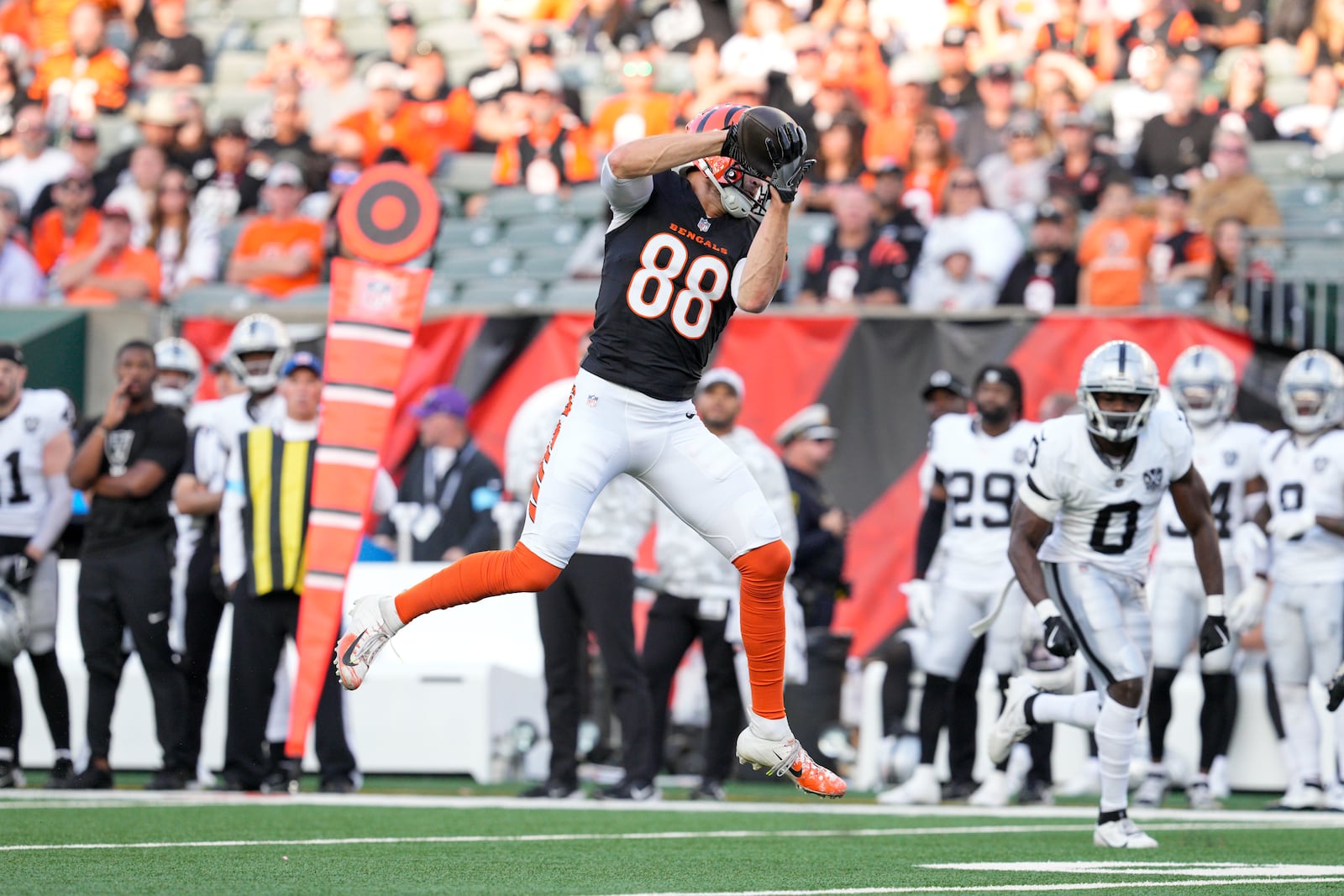 FILE - Cincinnati Bengals tight end Mike Gesicki (88) makes a catch for a touchdown during an NFL football game against the Las Vegas Raiders, Oct. 27, 2024, in Cincinnati. (AP Photo/Jeff Dean, File)