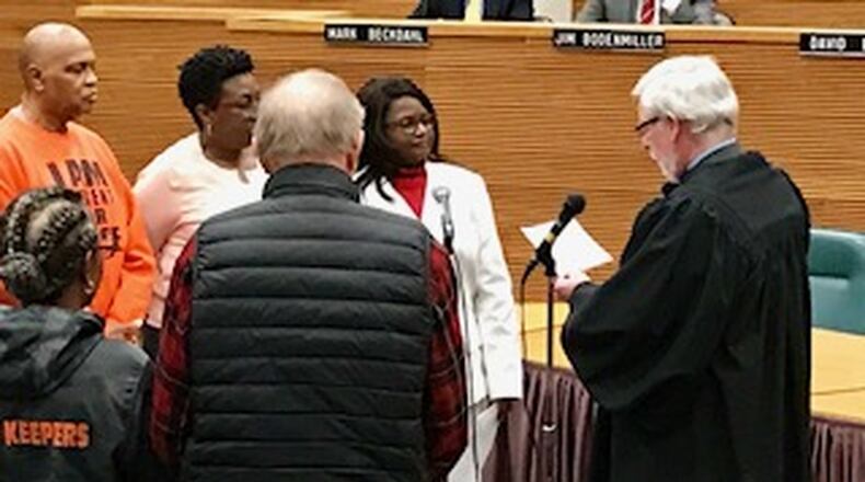 Springfield City Commissioner Joyce Chilton was sworn in for her third term on Tuesday evening by Judge Richard O’Neill. MICHAEL COOPER/STAFF