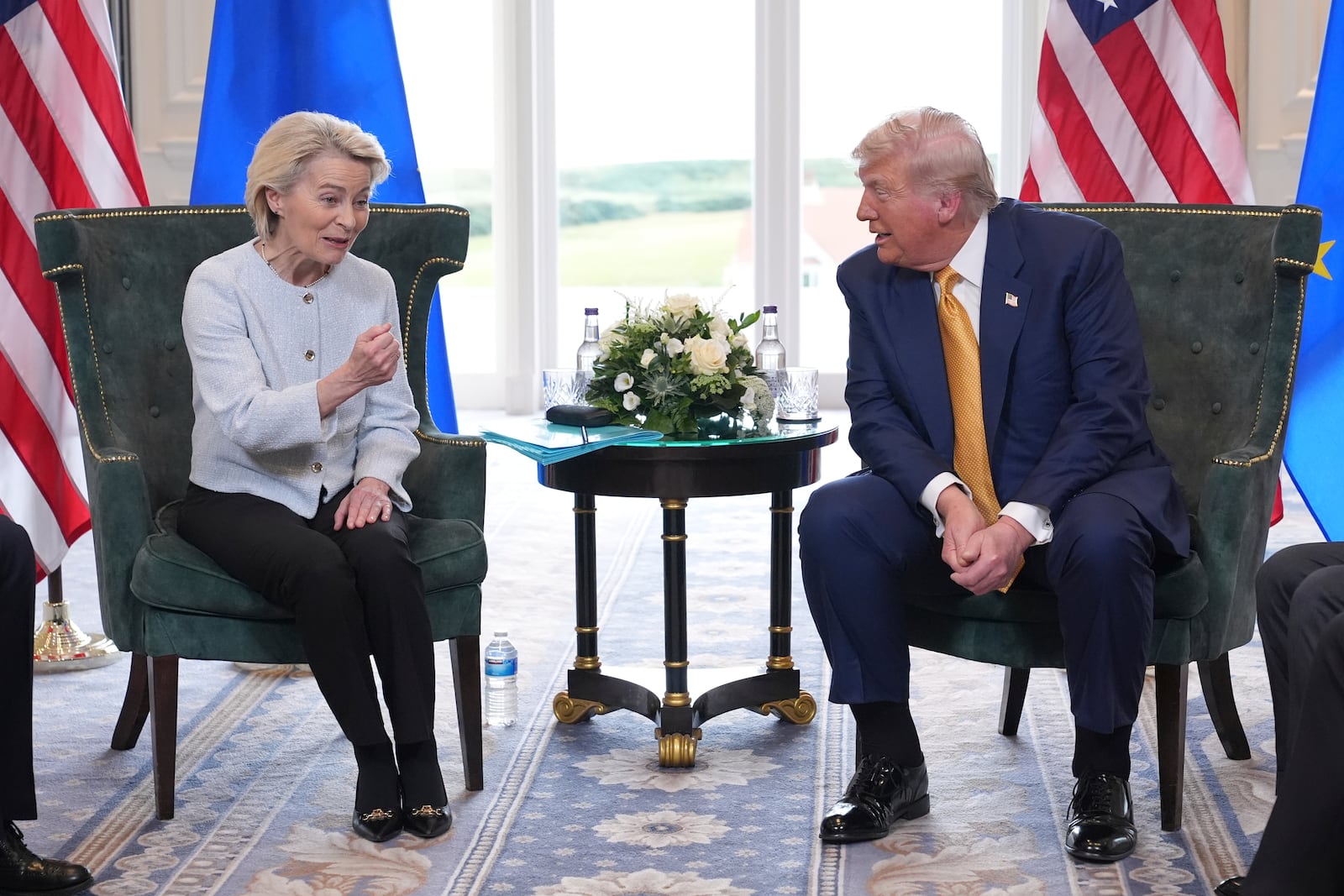President Donald Trump and European Commission President Ursula von der Leyen speak as they meet at the Trump Turnberry golf course in Turnberry, Scotland Sunday, July 27, 2025. (AP Photo/Jacquelyn Martin)