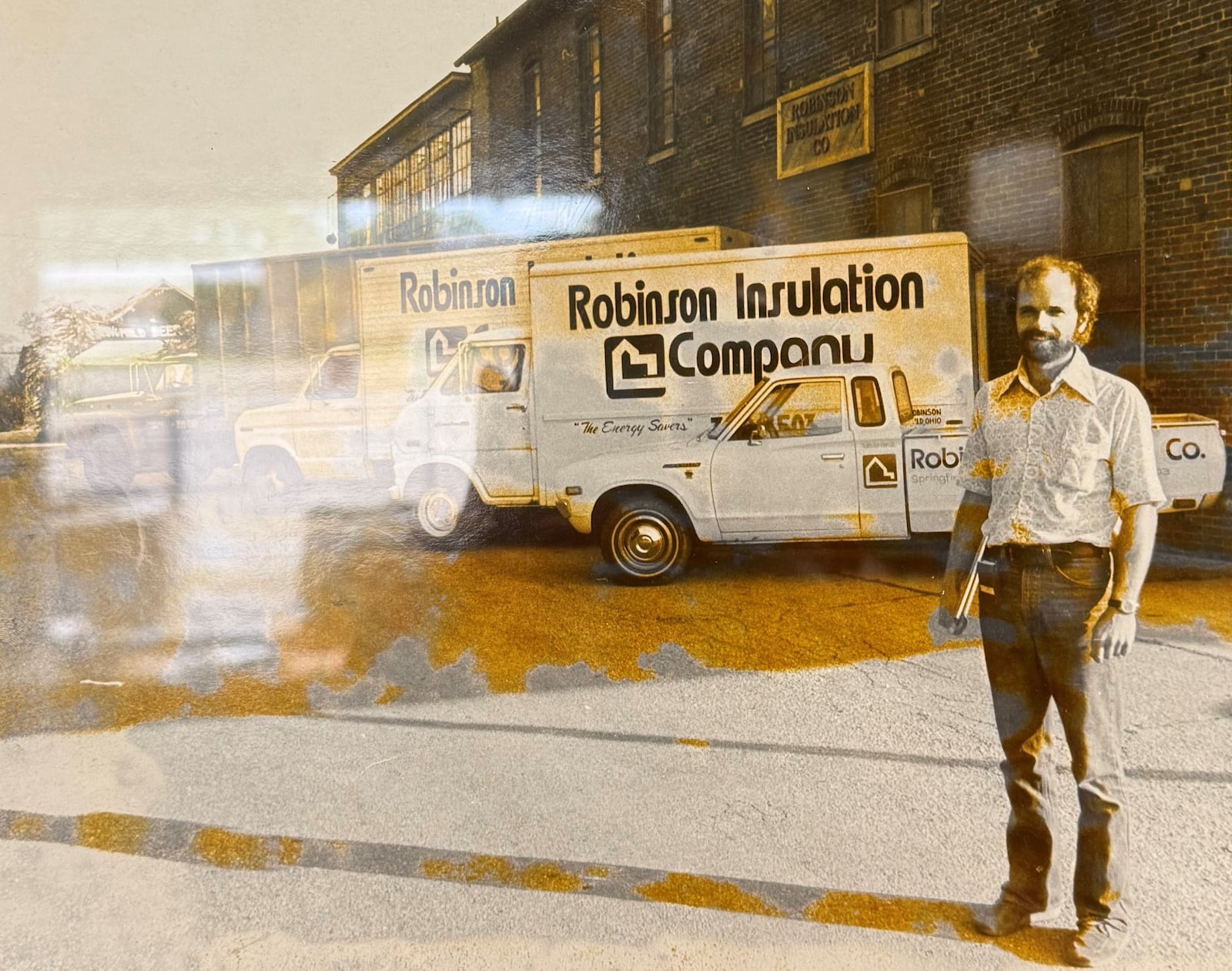 Garth Robinson poses outside of his company Robinson Insulation in 1977, two years after its founding. CONTRIBUTED