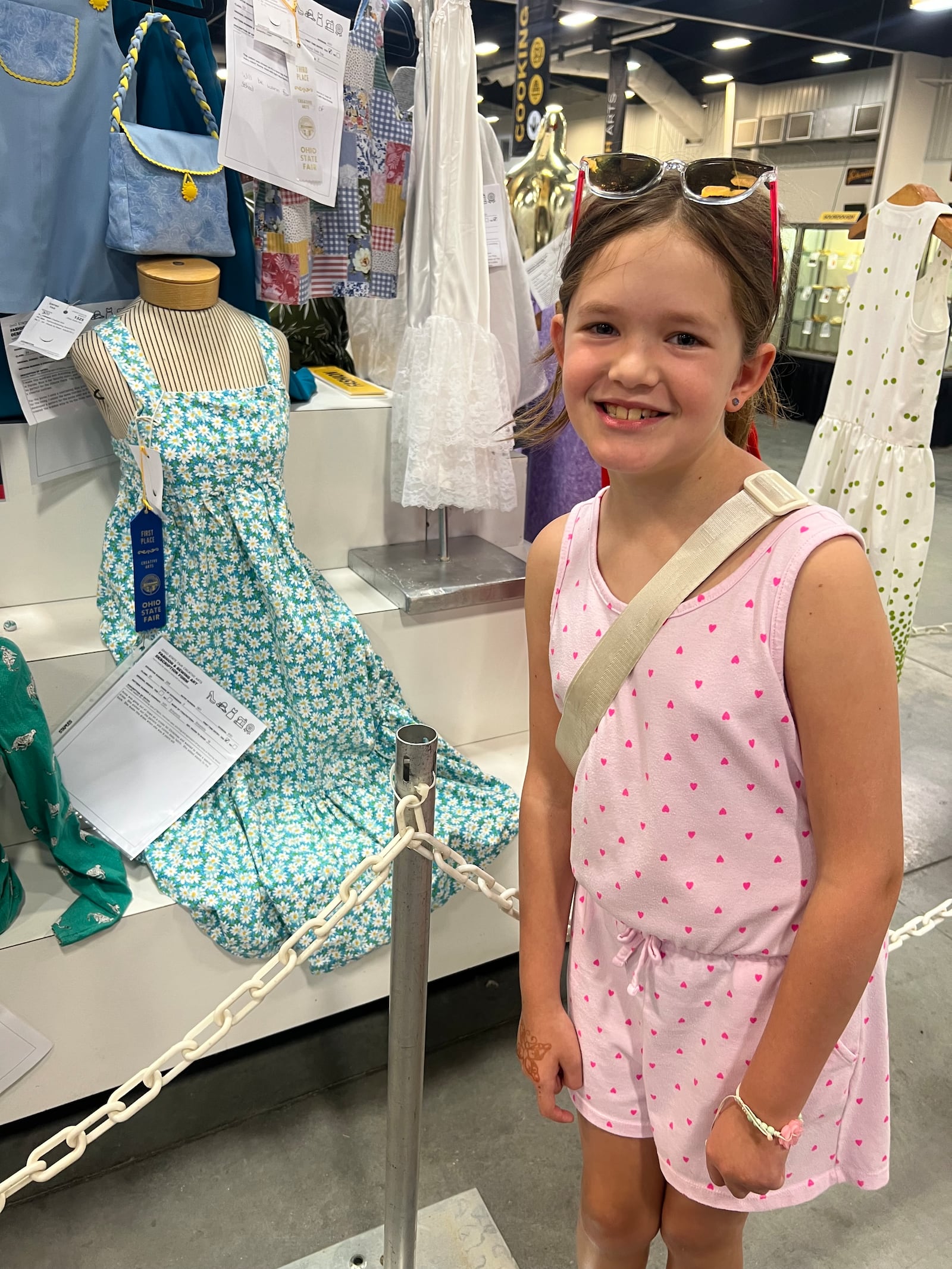 Anna Supinger is proud of the first place award she won for special occasion youth sewing. 
CONTRIBUTED