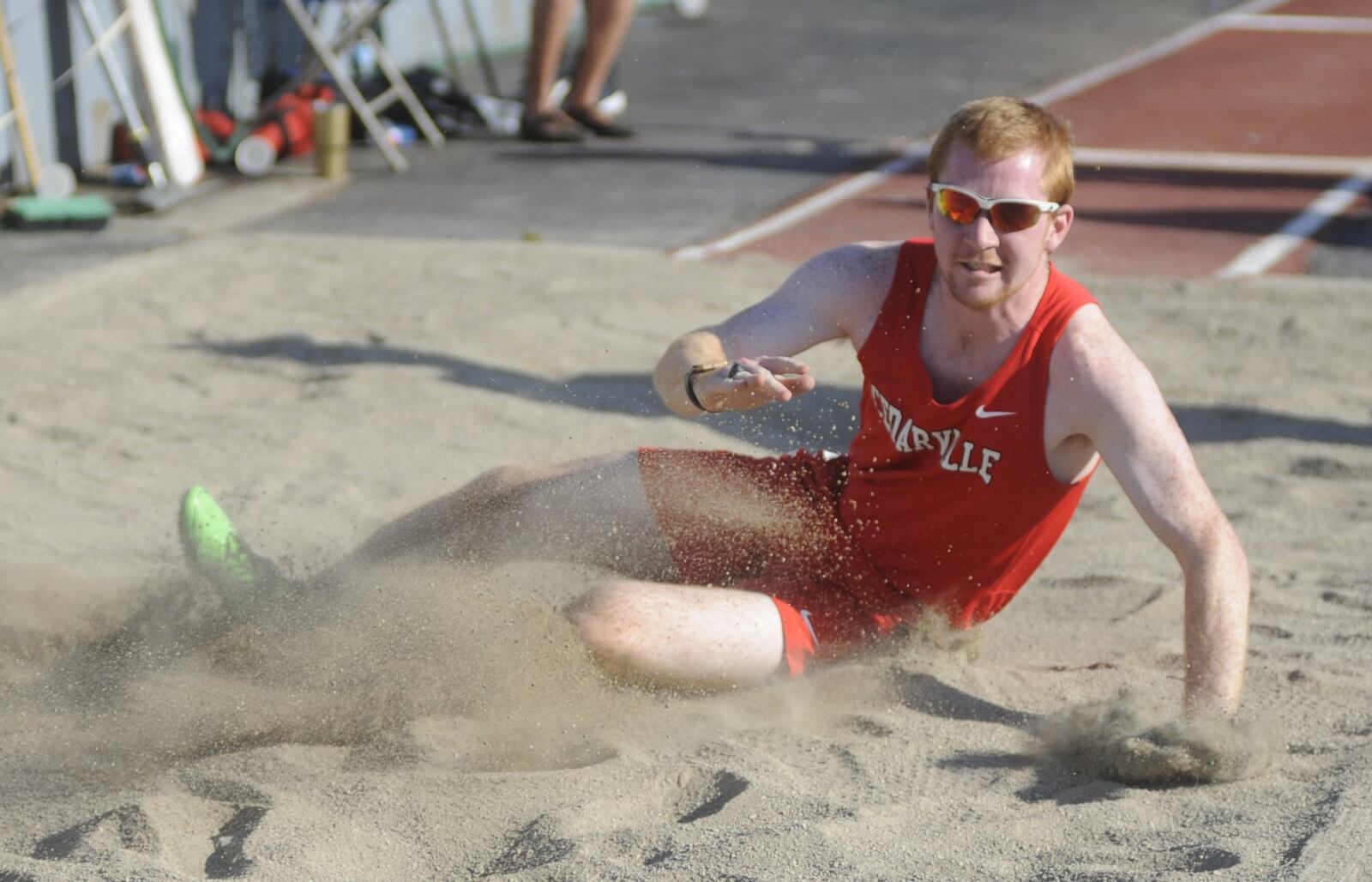 Cedarville senior Wesley Williams unloaded a best long jump of 20 feet, one inch to place fourth in the Division III high school district track and field meet at Dayton’s Welcome Stadium on Tuesday. MARC PENDLETON / STAFF