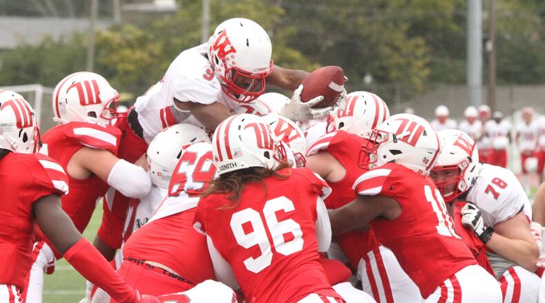 Wabash’s Isaac Avant scores against Wittenberg on Saturday, Oct. 27, 2018, at Edwards-Maurer Field in Springfield. David Jablonski/Staff