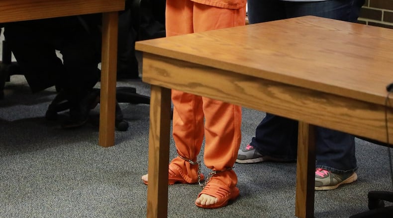 Clark County wants the case of a 15-year-old New Carlisle girl charged with murder and felonious assault bound over to adult court. BILL LACKEY/STAFF