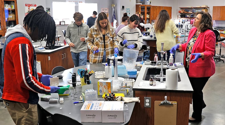 Global Impact STEM Academy science class Tuesday, March 28, 2023. BILL LACKEY/STAFF