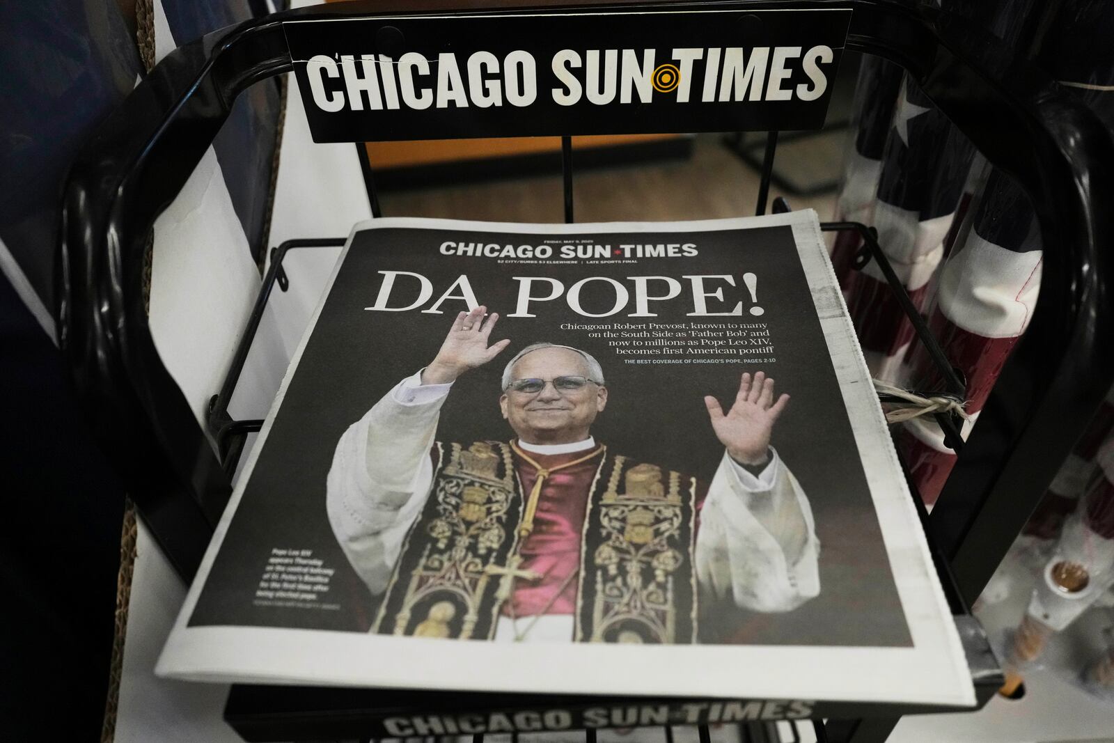 A Chicago Sun-Times newspaper front page shows "DA POPE!" at a grocery store in Mount Prospect, Ill., Thursday, May 9, 2025. (AP Photo/Nam Y. Huh)